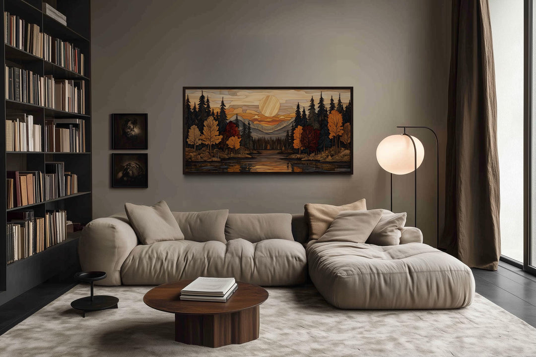 Autumn forest sunset rustic canvas wall art above a sofa in a cozy, modern living room.