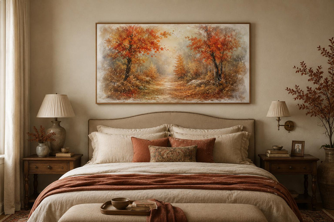 Autumn forest wall art with orange and rust trees in a misty woodland scene above a cozy bed.