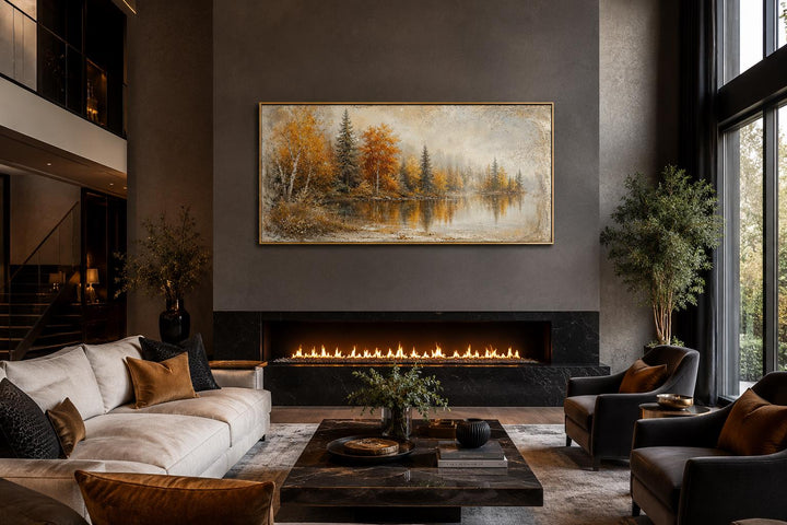 Autumn Lake Wall Art canvas featuring a misty forest landscape above a modern fireplace.