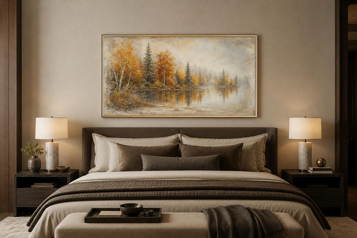 Autumn Lake Wall Art above a bed, featuring a misty landscape with orange and green fall trees.