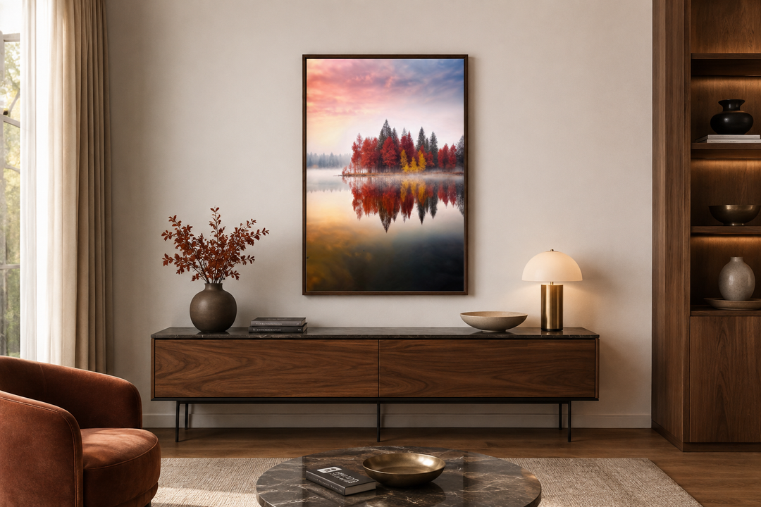 Vertical framed canvas wall art of red and gold autumn trees reflected in a calm lake at sunset.