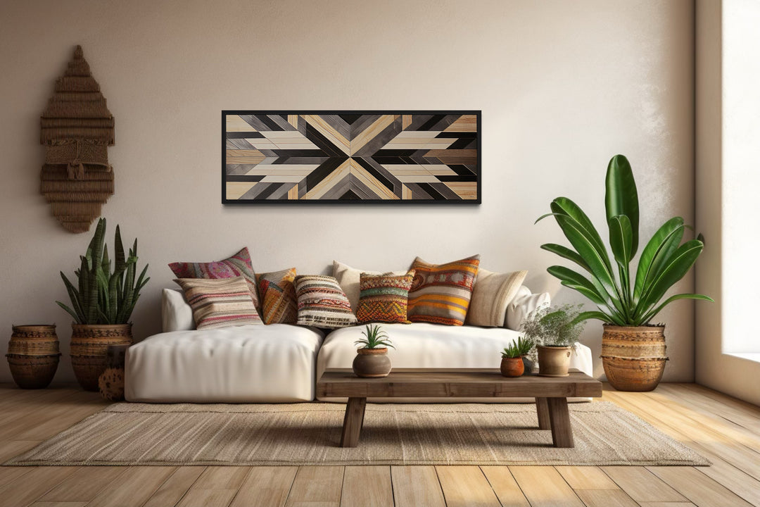 Horizontal Southwestern canvas wall art with a geometric Aztec-inspired wood panel design.