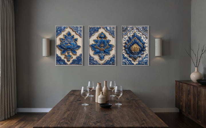 Set of three blue and gold azulejo tile canvas prints with intricate floral ceramic designs.