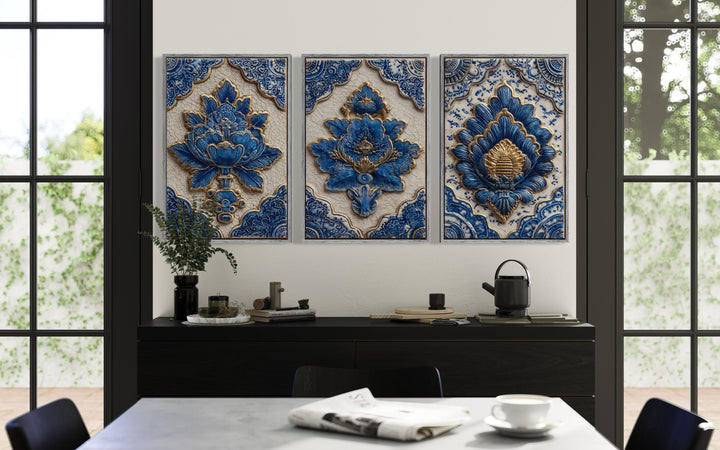 Set of three blue and gold azulejo tile canvas prints with intricate floral ceramic designs.