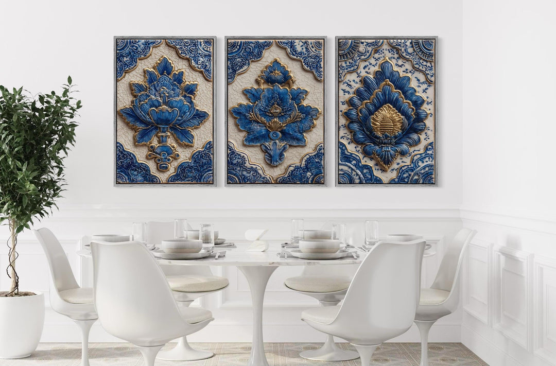 Set of three blue and gold azulejo tile canvas prints displayed above a modern white dining set.