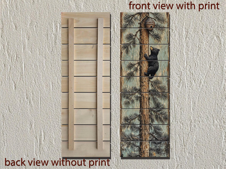 Front and back views of a rustic wood plank print featuring a baby bear climbing a pine tree.