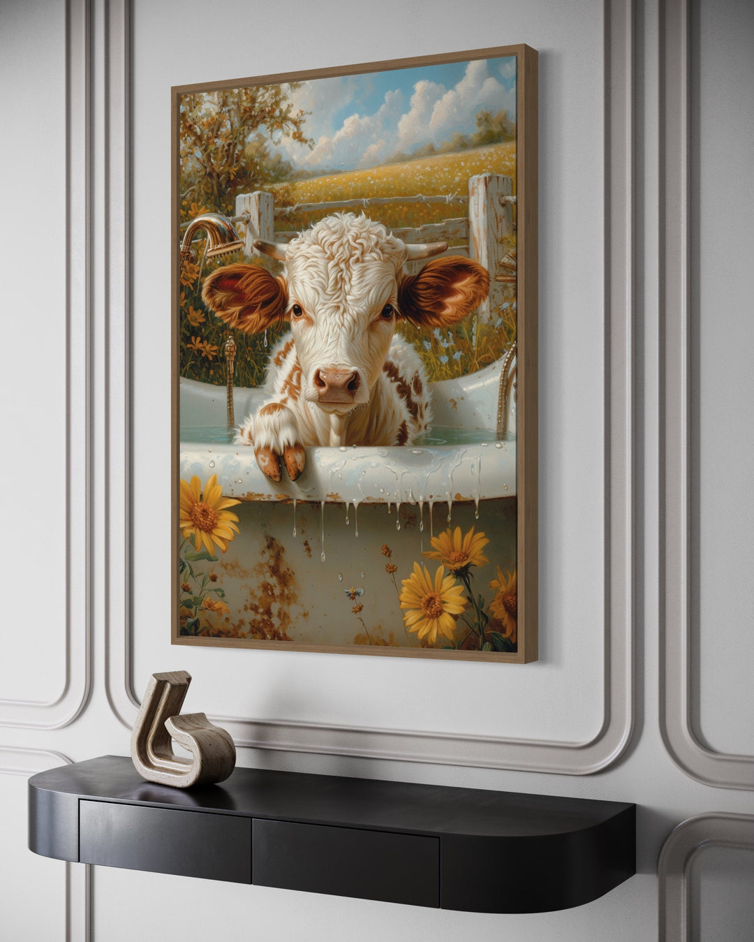 Framed canvas wall art of a baby highland cow calf in a bathtub.