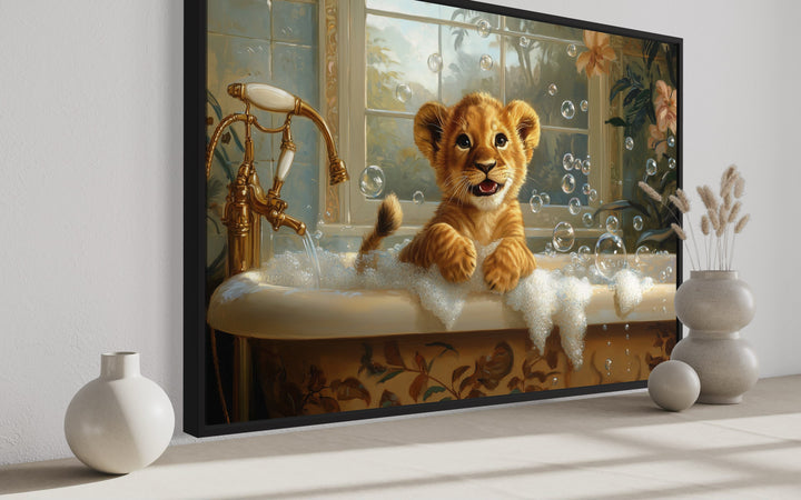 Baby Lion Cub in a Bathtub Framed Canvas Wall Art