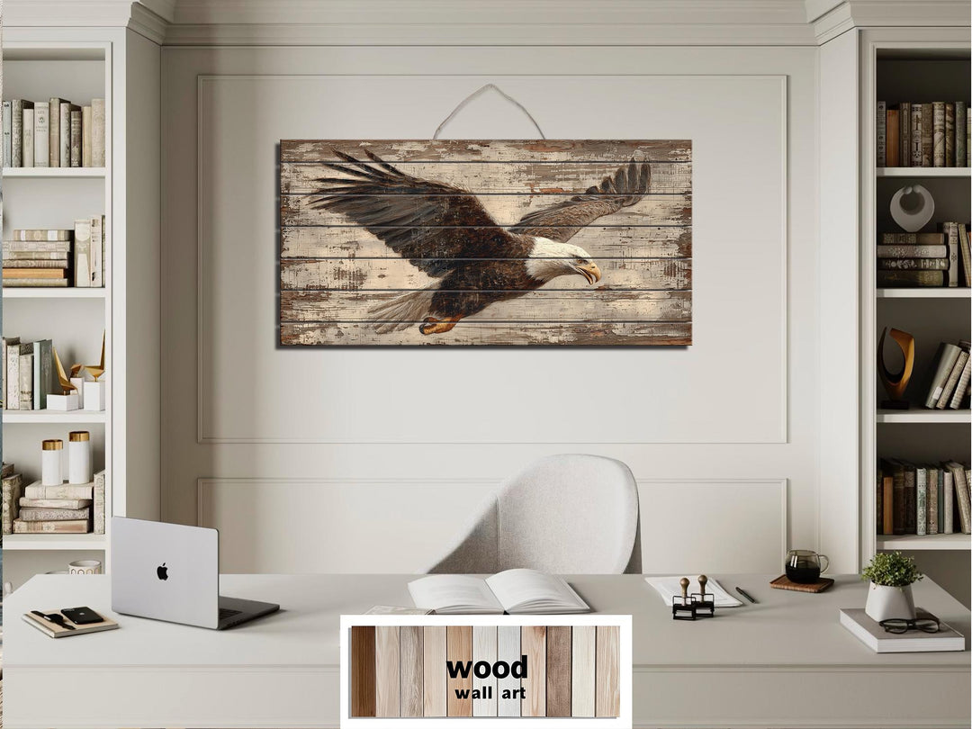 Bald eagle wall art printed on rustic distressed wood planks hanging in a modern office.