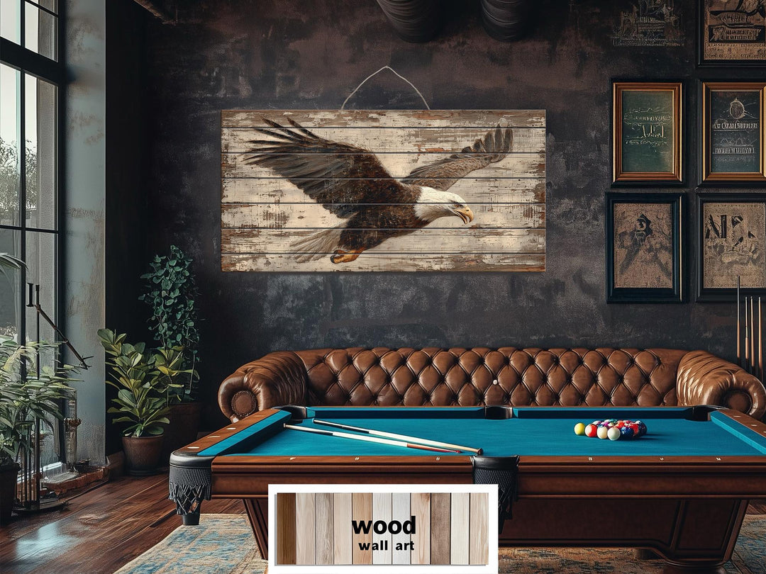 Bald Eagle wall art printed on rustic distressed wood planks above a leather sofa and pool table.