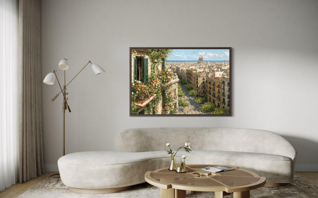 Barcelona Cityscape wall art featuring a floral balcony overlooking a European street and city.