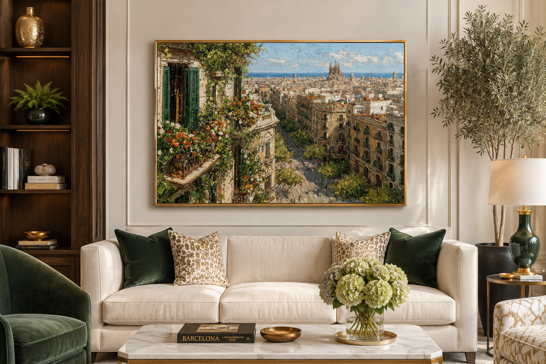 Barcelona cityscape canvas print with floral balcony view above a cream sofa in a living room.