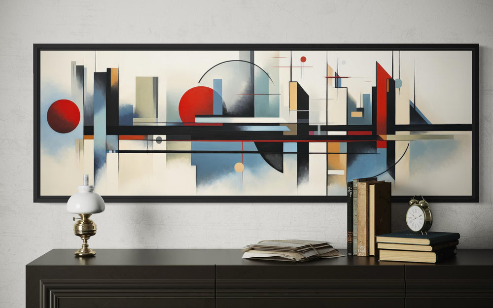 Bauhaus wall art featuring a geometric abstract painting in a black frame above a dark console.
