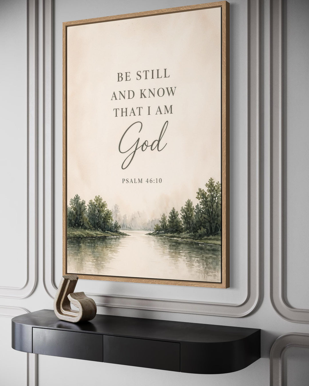 Be Still and Know That I Am God scripture wall art featuring a watercolor landscape in a wood frame.