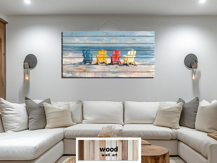 Colorful Adirondack chairs on a rustic wood wall art panel hanging above a white sectional sofa.