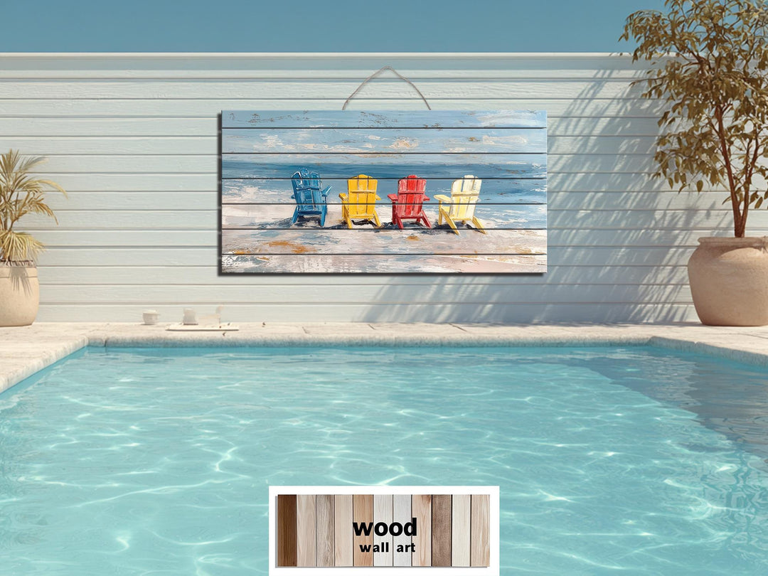 Colorful Adirondack chairs on a rustic wood print wall art hanging above a swimming pool.