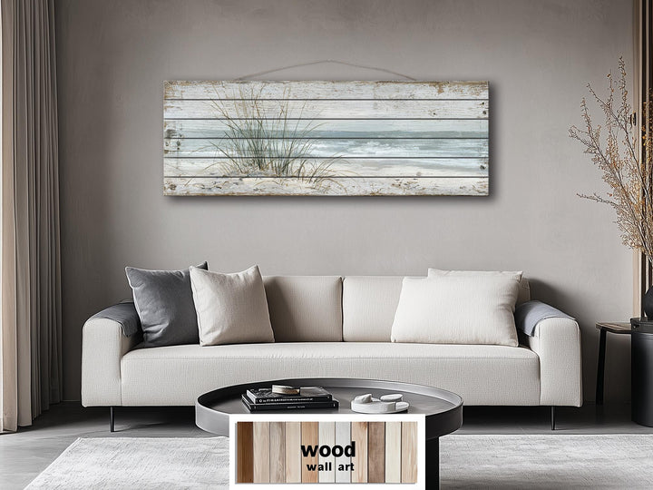 Beach sand dunes and sea grass printed on a long narrow horizontal wood plank wall art piece.