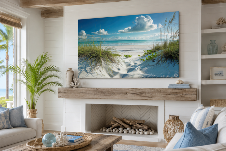 Coastal framed canvas wall art featuring sand dunes and grass on a beach under a blue sky.