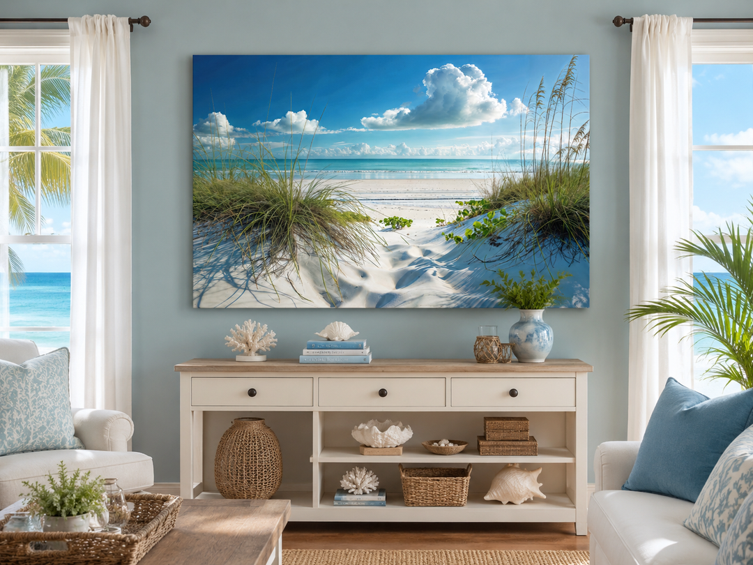 Coastal framed canvas wall art featuring sand dunes and grass under a blue sky in a living room.