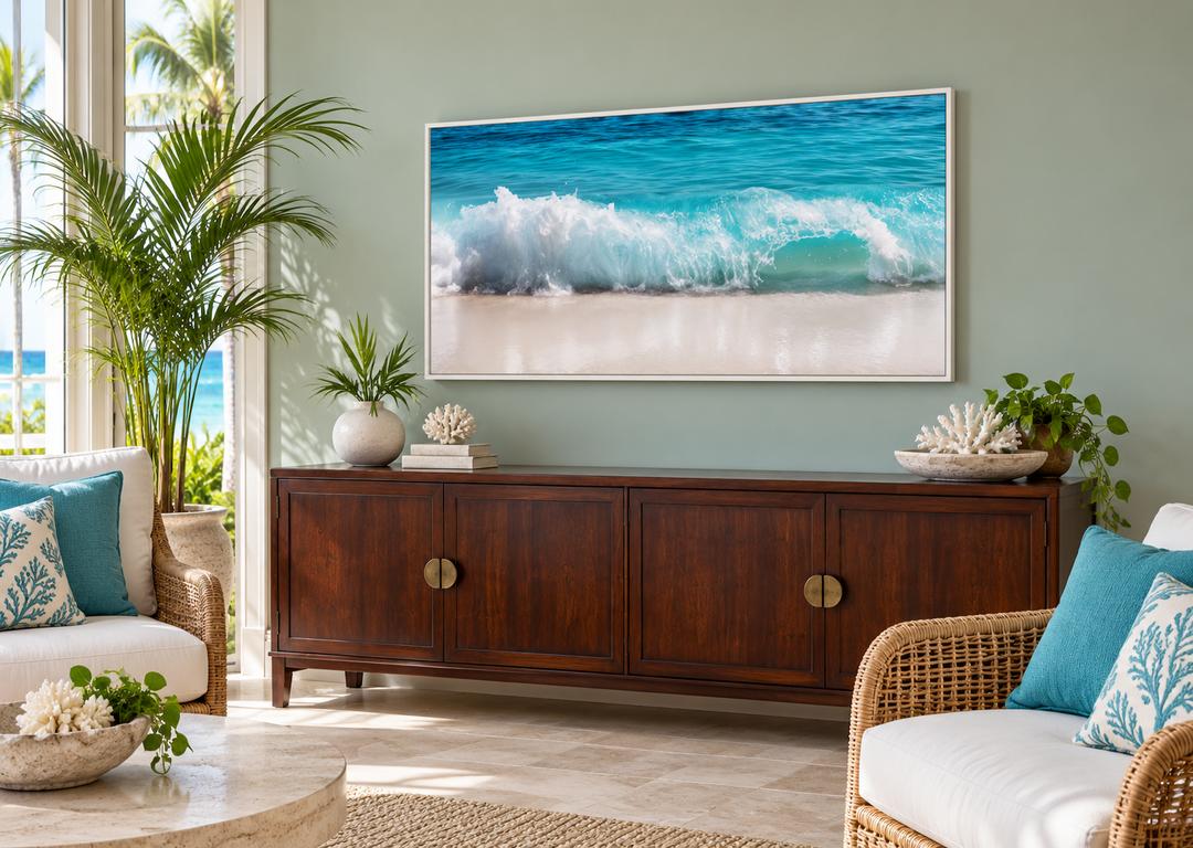 Ocean wave photography coastal framed canvas wall art in a tropical sunroom setting.