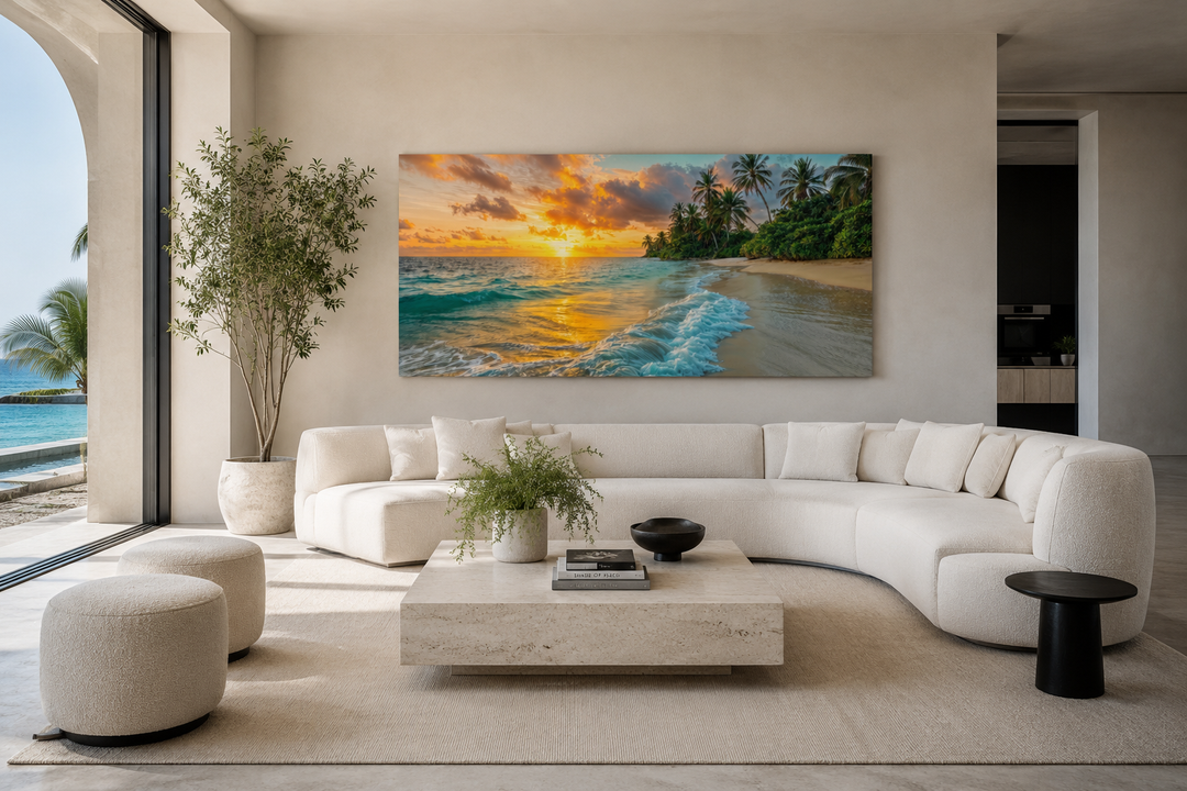 Tropical beach at sunset framed canvas wall art hanging above a white sofa in a modern living room.