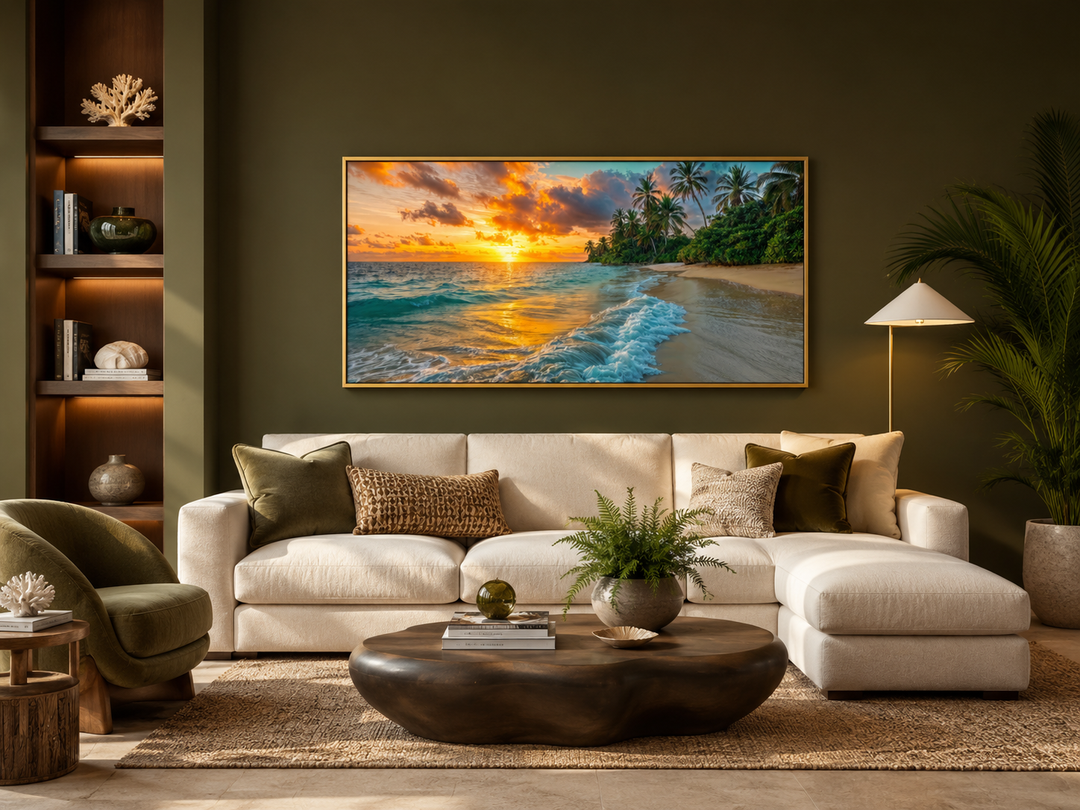 Tropical beach at sunset framed canvas wall art above a white sectional sofa in a living room.