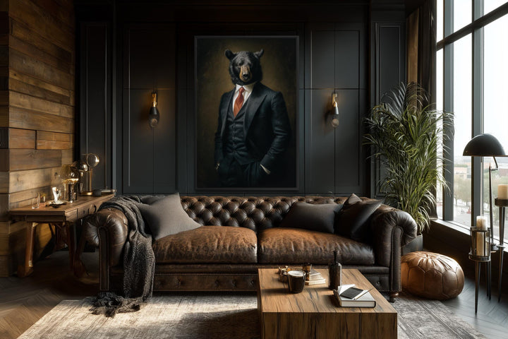 Framed canvas wall art of a bear in a tailored suit hanging in a dark, modern office setting.