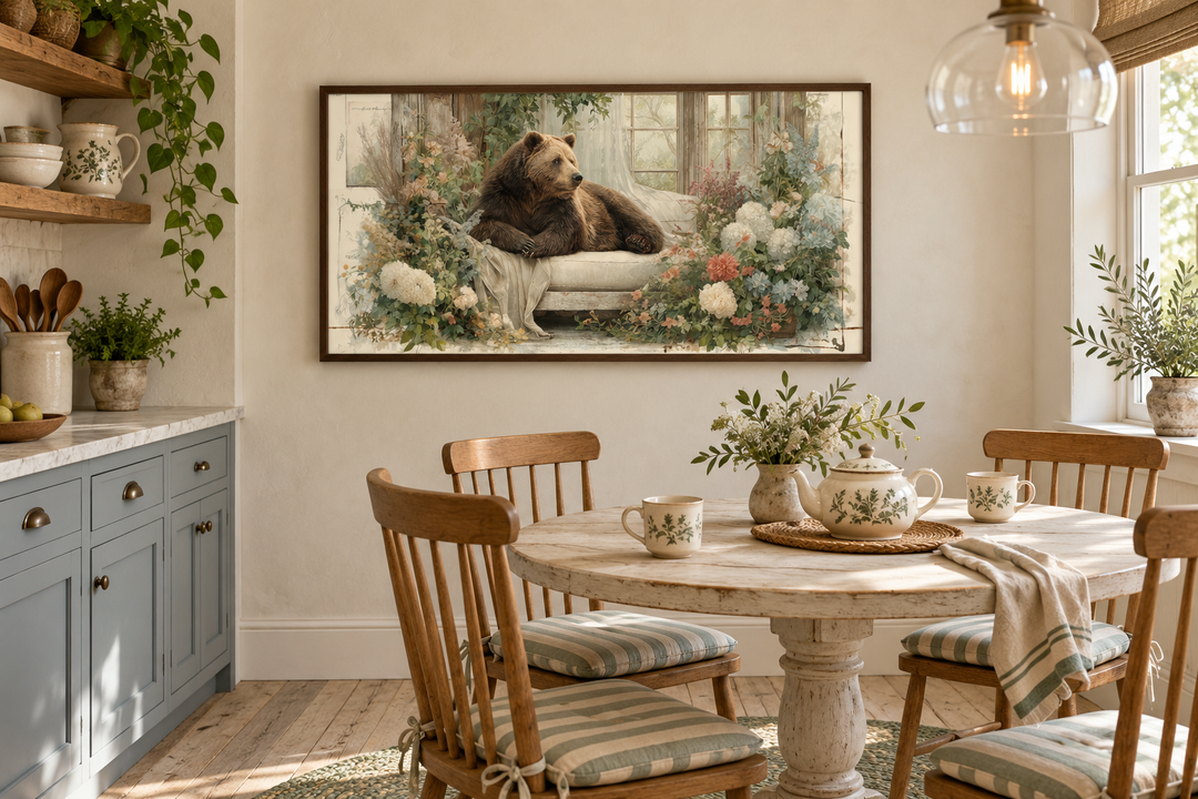 Bear on Couch Floral Canvas Wall Art in a walnut frame above a farmhouse breakfast nook table.