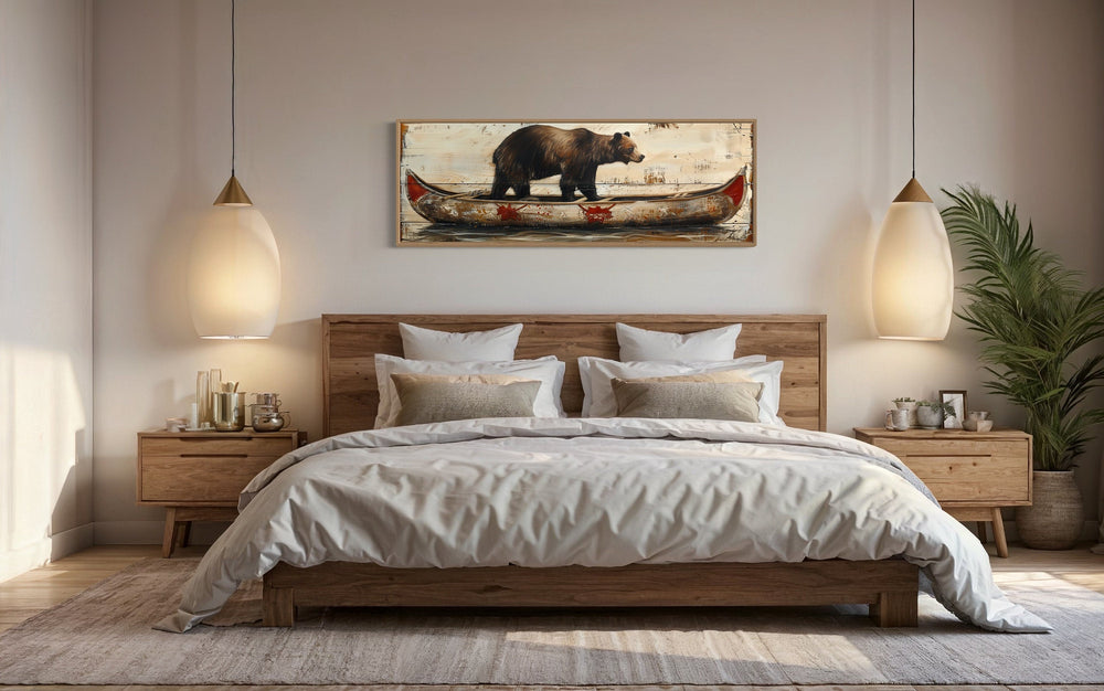 Bear In Canoe Cabin Wall Art above rustic bed