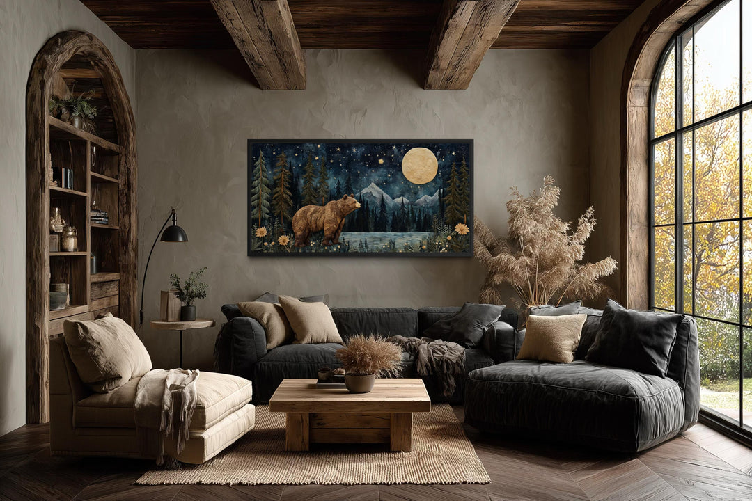 Bear in night forest wall art canvas print with full moon and mountain landscape in a rustic room.