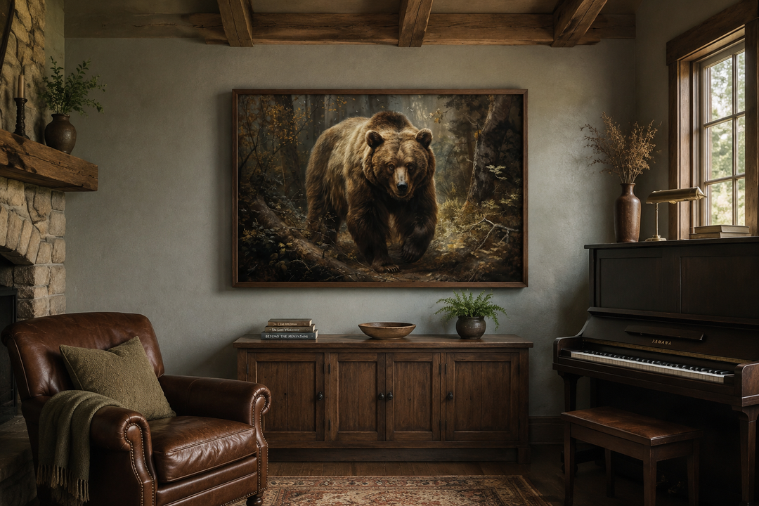 Framed canvas wall art of a bear in a forest, hanging above a wooden sideboard in a rustic room.