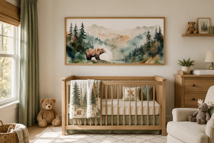 Watercolor framed canvas wall art of a bear in a wilderness forest above a wooden baby crib.