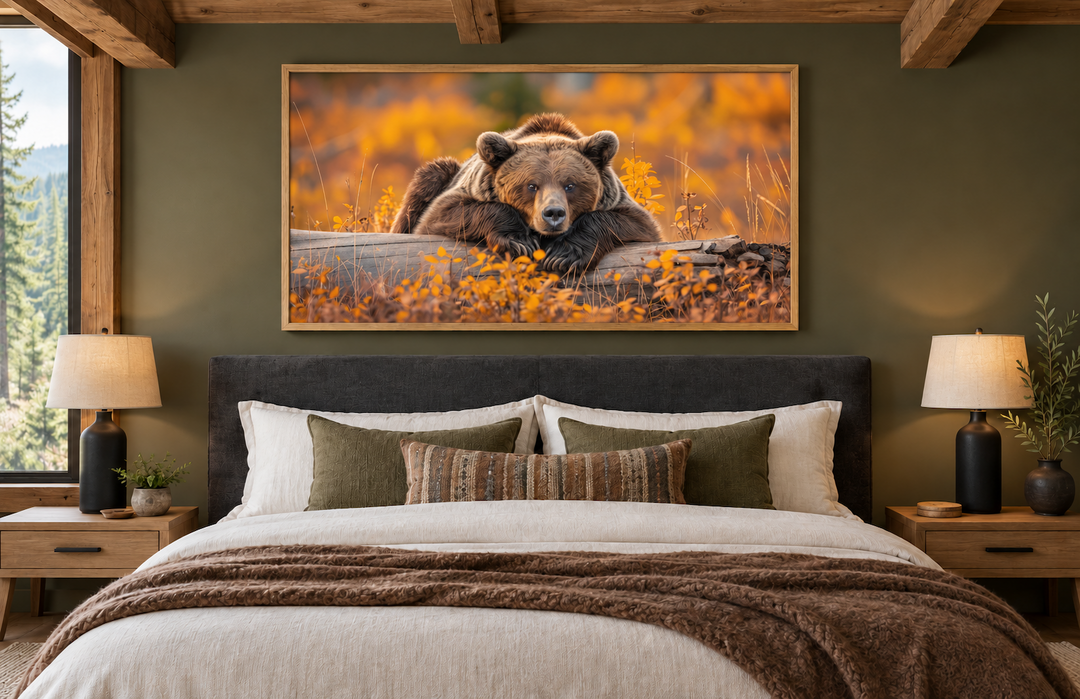Grizzly bear on a log wall art in a rustic cabin bedroom with autumn forest colors.