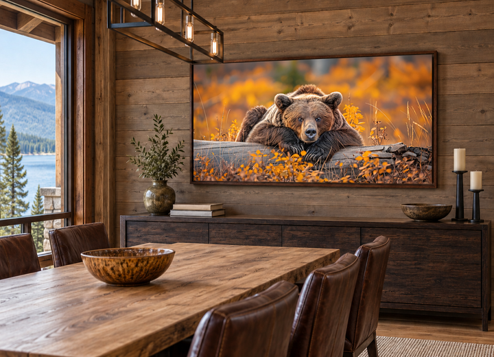 Grizzly bear on a log wall art in a rustic dining room with autumn forest colors.