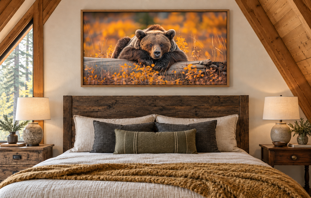 Grizzly bear on a log wall art in a rustic cabin bedroom with autumn forest colors.