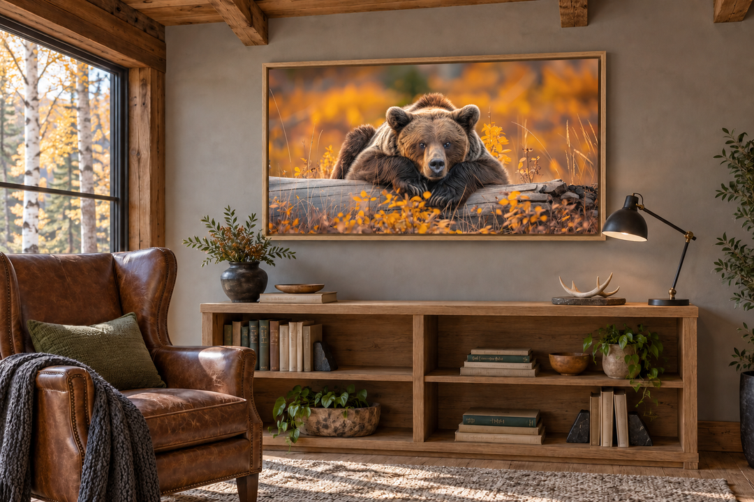 Grizzly bear on a log wall art in a rustic cabin setting with autumn forest colors.