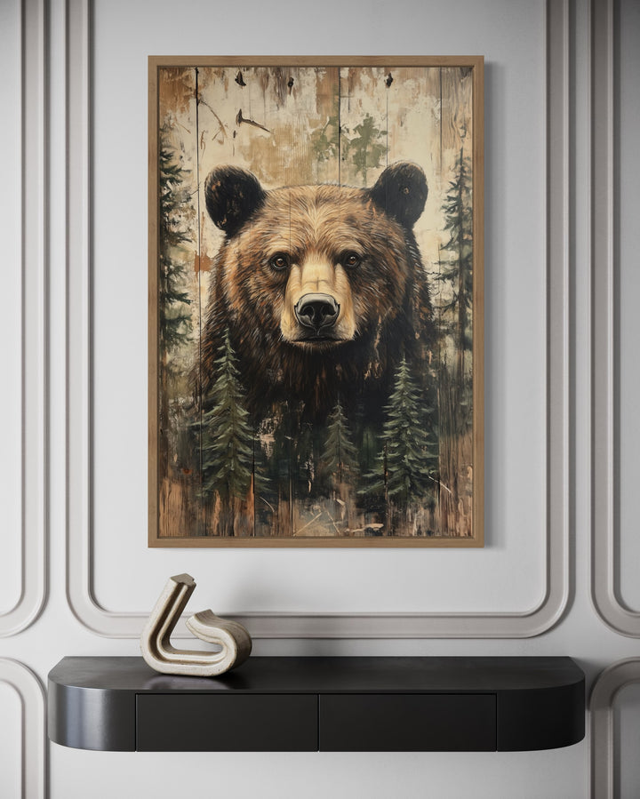 Rustic framed canvas wall art of a bear portrait on a wood-textured background for cabin decor.