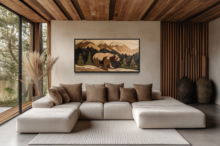 Rustic bear painting on wood panel canvas wall art above a modern sofa in a cabin-style living room.