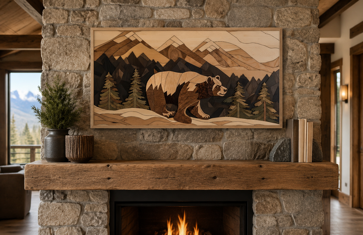 Bear painting on wood canvas wall art featuring a rustic mountain landscape above a fireplace.