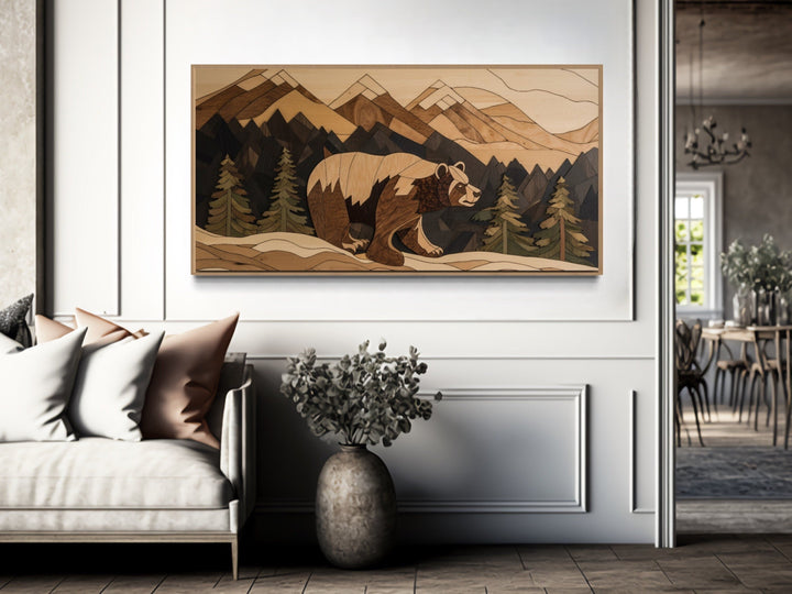 Rustic bear painting on wood canvas wall art featuring a mountain landscape in a modern living room.