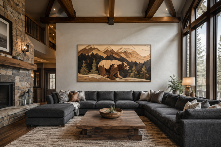 Bear painting on wood canvas wall art in a rustic living room with mountain landscape design.