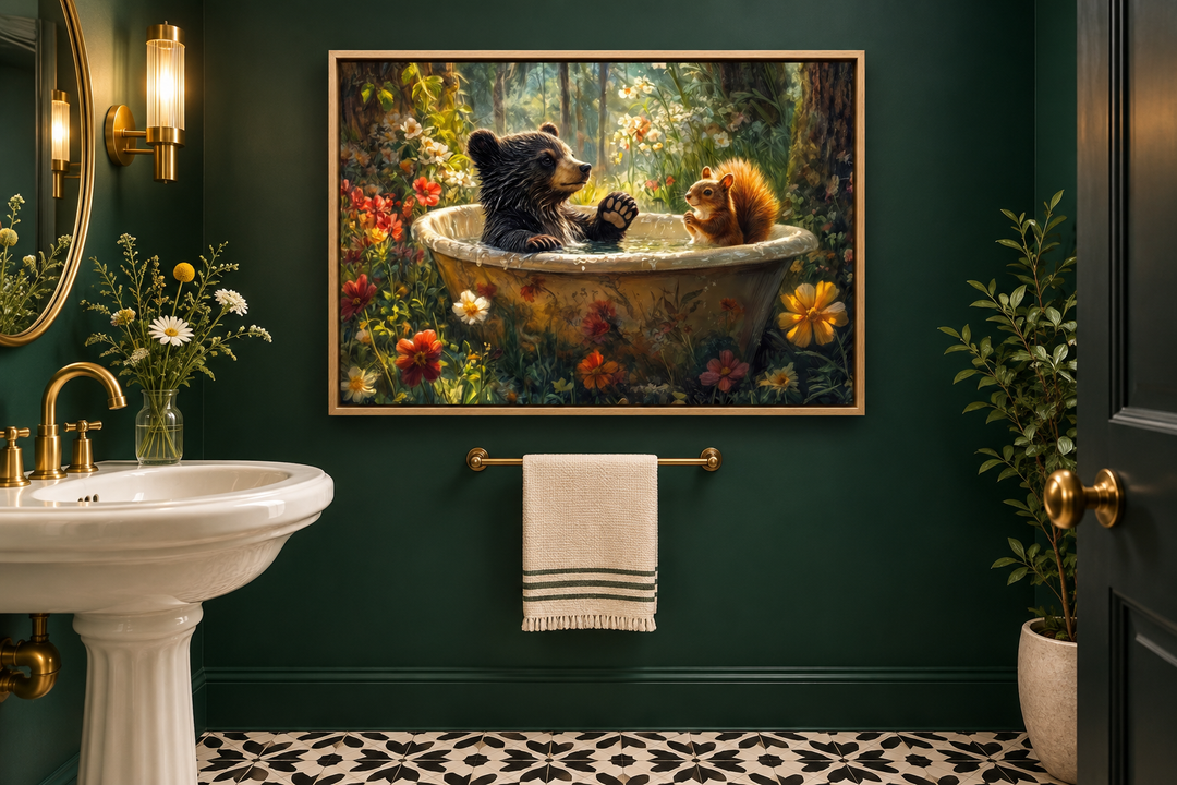 Framed canvas art of a bear and squirrel in a bathtub, hung in a dark green bathroom.