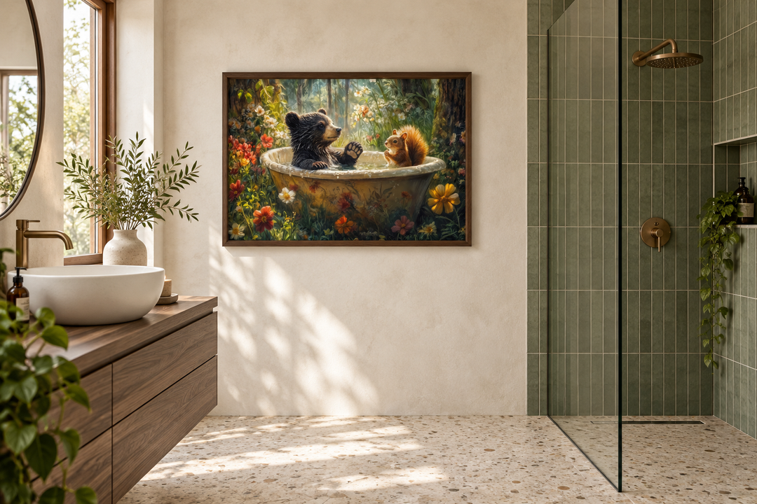 Framed canvas wall art of a bear and squirrel in a bathtub, hanging in a modern bathroom.