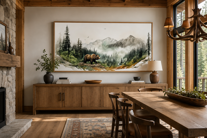 Bear in the forest mountain landscape wall art in a rustic dining room with wooden furniture.