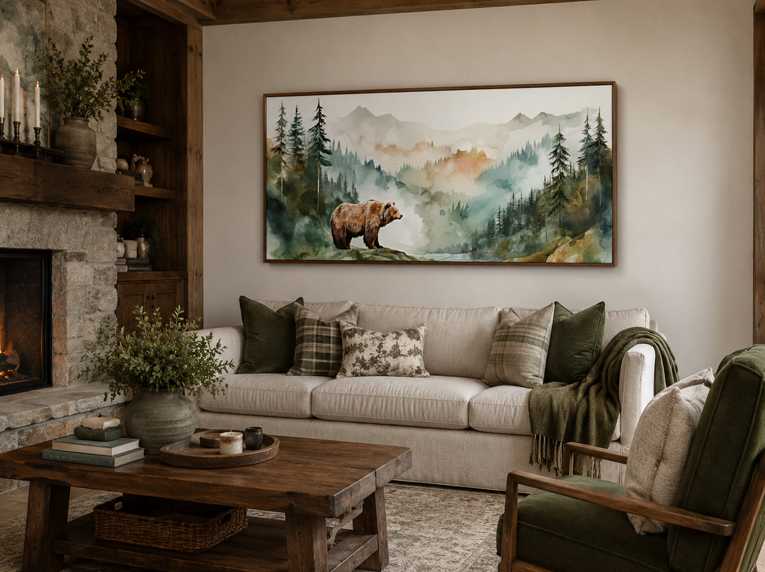 Bear in the wilderness forest watercolor framed canvas wall art hanging above a beige sofa.