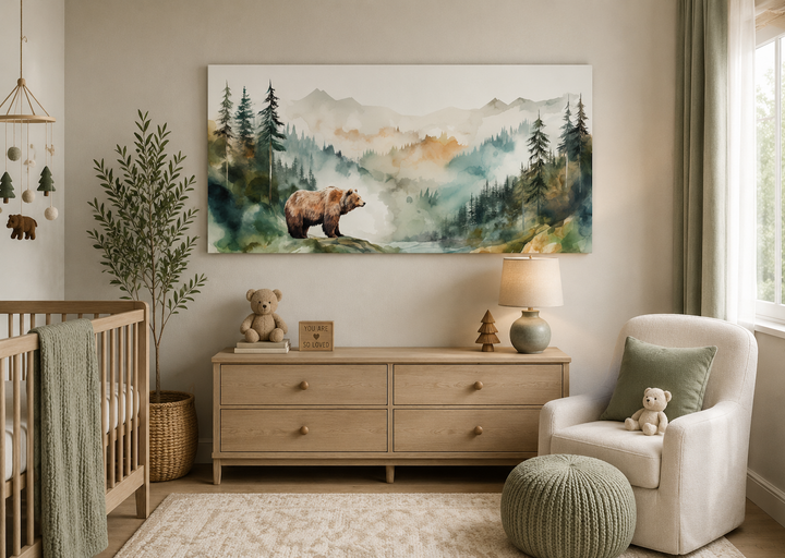 Bear in the wilderness forest watercolor framed canvas wall art hanging in a neutral nursery.