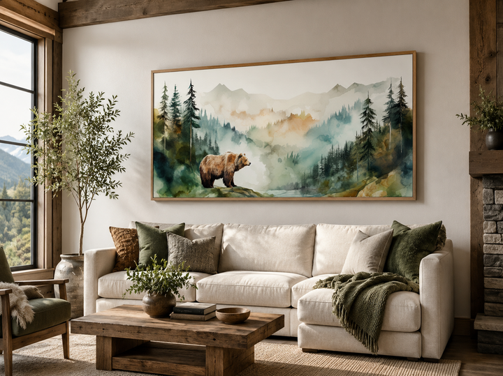 Bear in the Wilderness Forest Watercolor Framed Canvas Wall Art above a cream sofa in a rustic room.