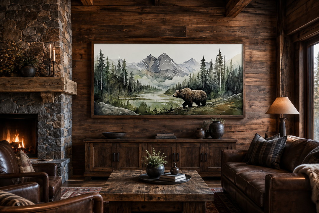 Large watercolor canvas of a bear in a forest and mountain landscape, framed in a rustic cabin room.