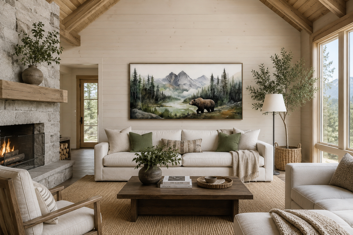 Large bear watercolor painting on canvas in a rustic living room above a white sofa.
