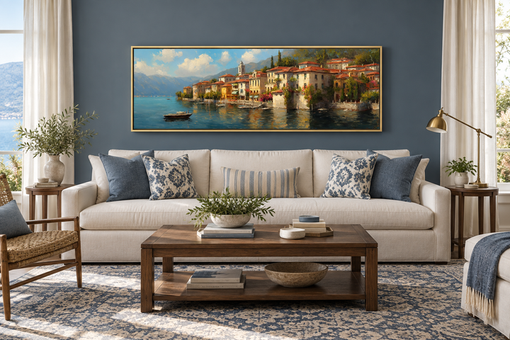 Bellagio Lake Como framed canvas wall art above a white sofa in a blue living room.